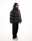 Чорний пуховик оверсайз