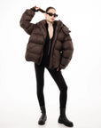 Коричневий пуховик оверсайз