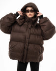 Коричневий пуховик оверсайз
